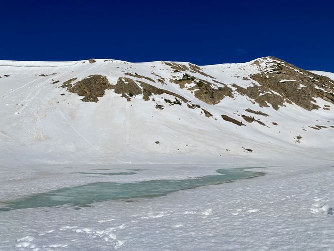 View of Pass Lake, frozen in early June 2024