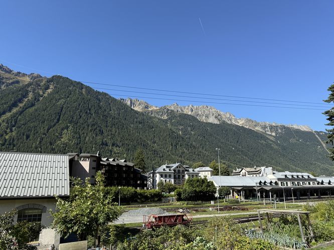 View of Chamonix and Aiguilles Routes (Red Needles) massif in the background