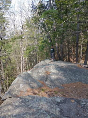 Be cautious of climbers apparatus on the tops of ledges