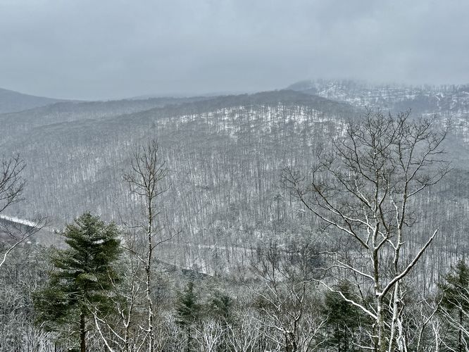 Ansonia Knob sits in the clouds with a view of Pine Creek below