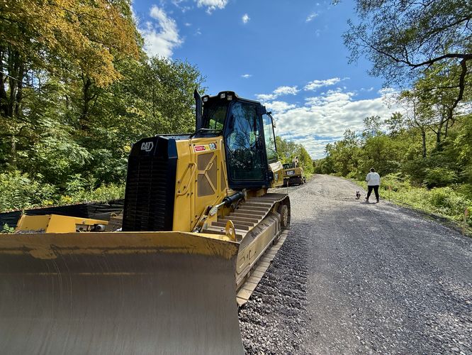 Heavy machinery from the new Pine Creek Trail extension's construction