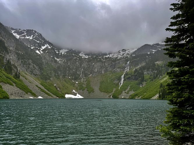View of Rainy Lake, dark turquoise waters, and its waterfalls