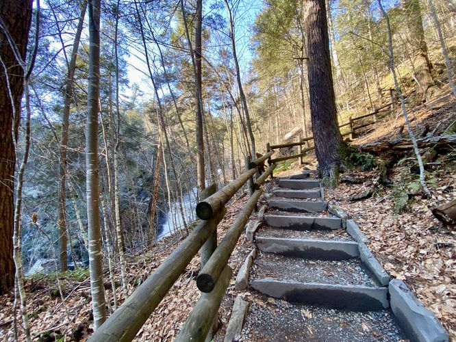 Hiking up the stairs to reach the top of Raymondskill Falls