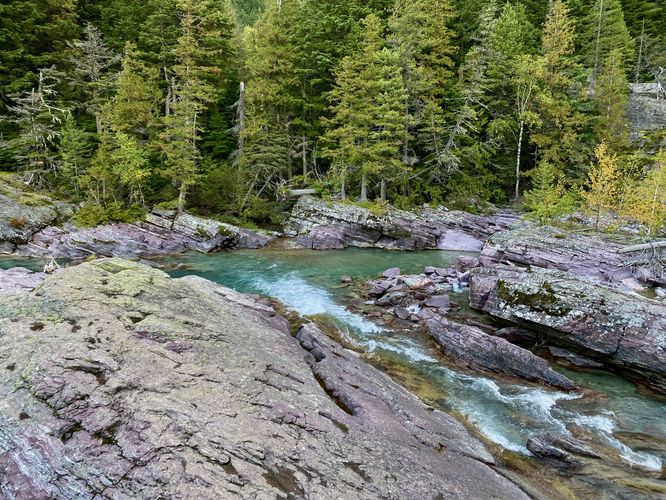 Small rapids in McDonald Creek's turquoise water