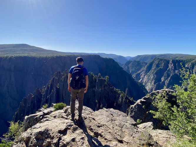 Dave at the rim of the Black Canyon along the Rim Rock Trail