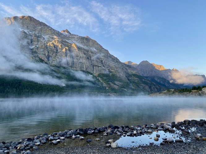 View of Saint Mary Lake and surrounding alpine mountains from the trail