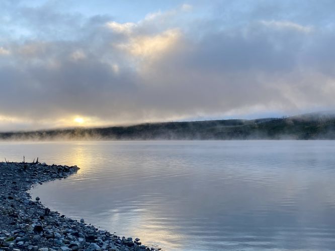 Sun rises over the lake