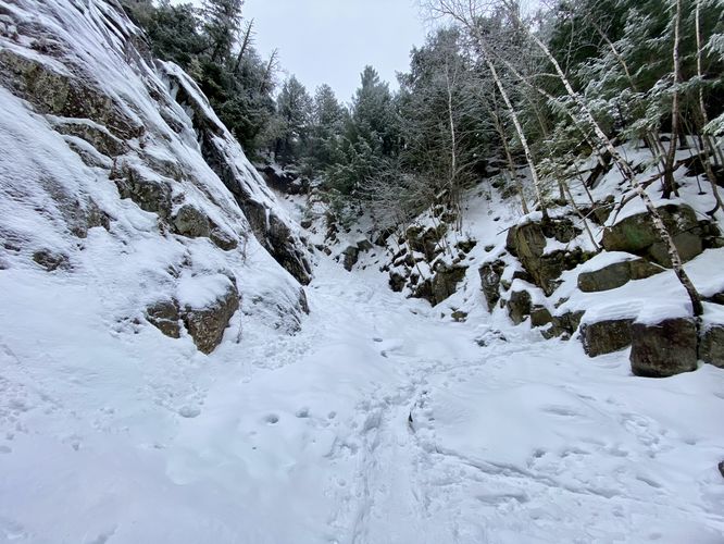 Looking down the ice-covered Roaring Brook from the base of Roaring Brook Falls