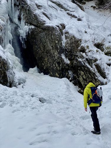 At the base of Roaring Brook Falls