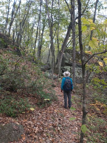Looking at the massive boulders ahead on the trail. 