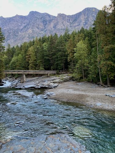 Mount Brown stands behind the turquoise waters of McDonald Creek