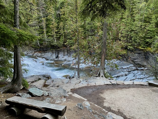 Bench sits at a viewing area for McDonald Falls