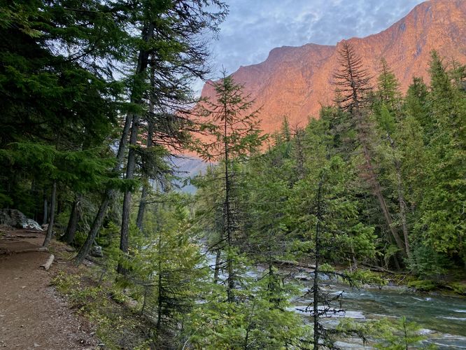View of McDonald Creek, Mount Brown, and the trail during sunset