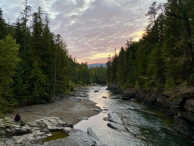 Sunset view over McDonald Creek from the footbridge