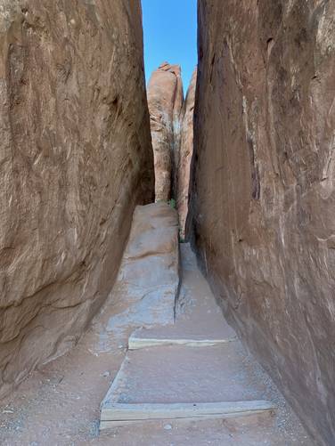 Short uphill hike into the sandy area to reach the Sand Dune Arch