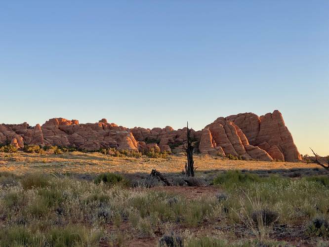 View of the rock outcropping that houses the Sand Dune Arch