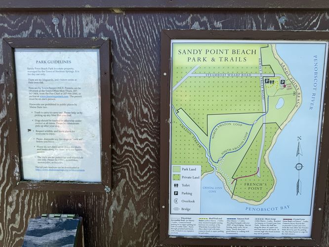 Trail rules and map at Sandy Point Beach Park