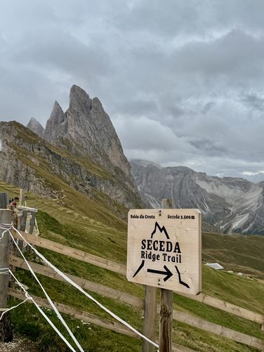 Seceda Ridge Trail sign along the path