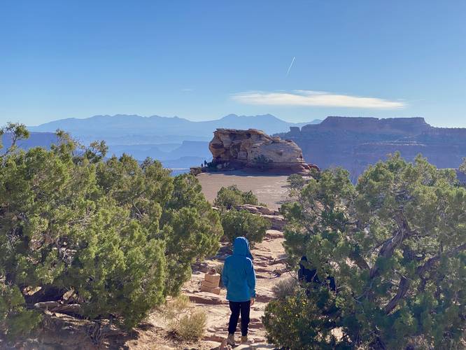 Hikers descend the trail to reach the Shafer Canyon Overlook