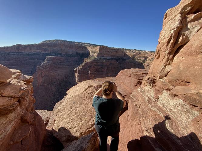 Nina snaps a photo of Shafer Canyon