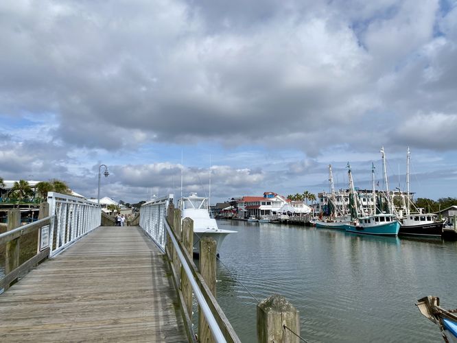 Fishing boats docked in Shem Creek, walking the boardwalk