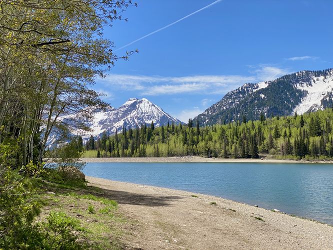 View of the reservoir and Mt. Timp's snow-capped peaks