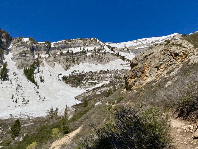 Snowfields cover White Baldy mountain's slopes in late May 2024