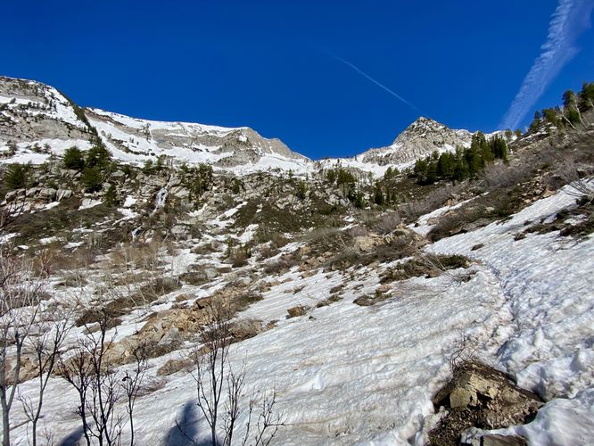 Hiking snow fields up the Silver Lake Trail