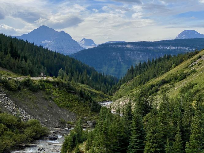 View of Siyeh Creek and alpine mountains from the road