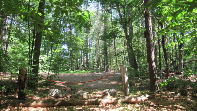Chain gate and additional parking to access Smith Brook Trail
