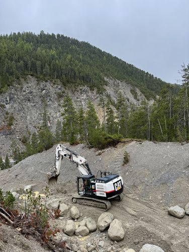 Heavy machinery in the dry run tributary