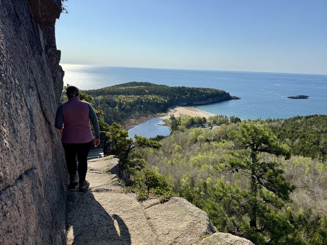 Steep cliff views of Sand Beach from The Beehive