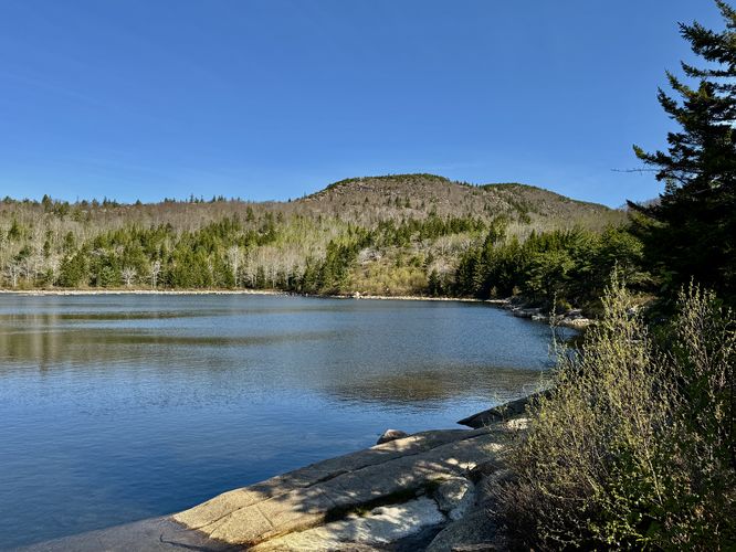 Shore side view of The Bowl and slopes of Champlain Mountain