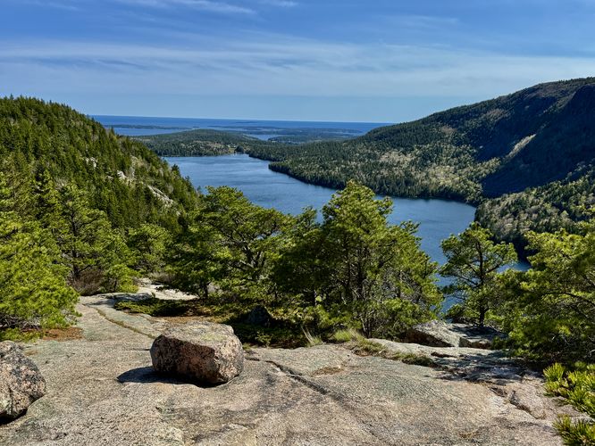 View of Jordan Pond, Penobscot Mountain, and the Atlantic Ocean from slopes of North Bubble