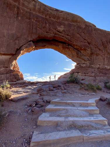 Hikers below the North Window Arch
