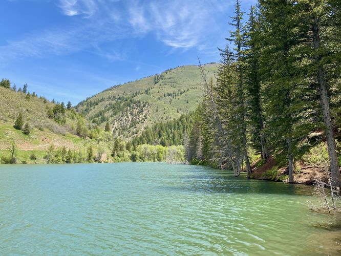 View of the TIbble Fork Reservoir's turiquoise-tinted waters