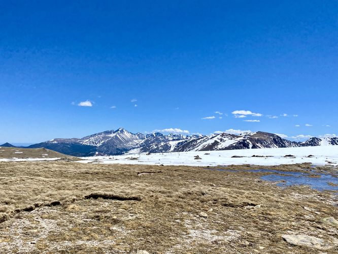 View of snow-capped alpine mountains from the trail
