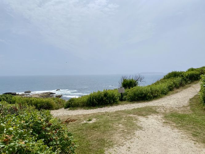 Dirt path leads to views of the Atlantic Ocean