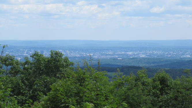 Manchester NH in the distance from North Uncanoonuc Mountain