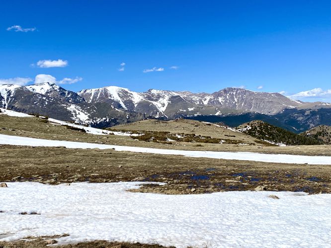 Snow-capped mountains surround the Ute Trail on Tombstone Ridge