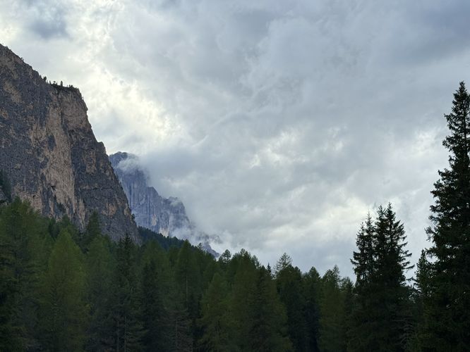 Clouds moved into Vallunga high above the evergreens