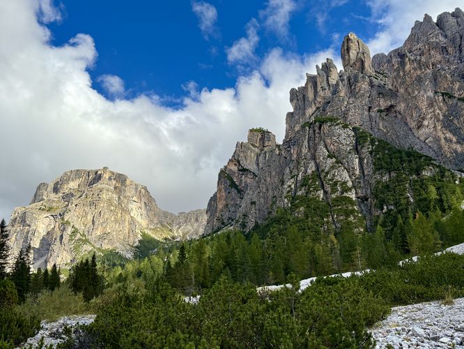 Jagged limestone walls tower over the trail