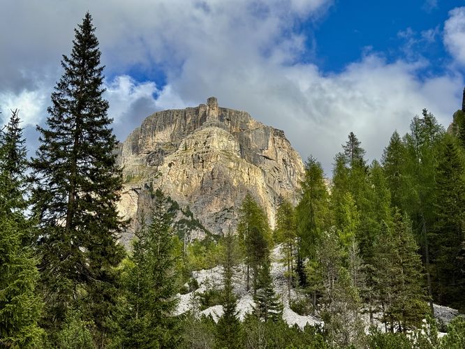 Another view of Col Turond between the evergreens