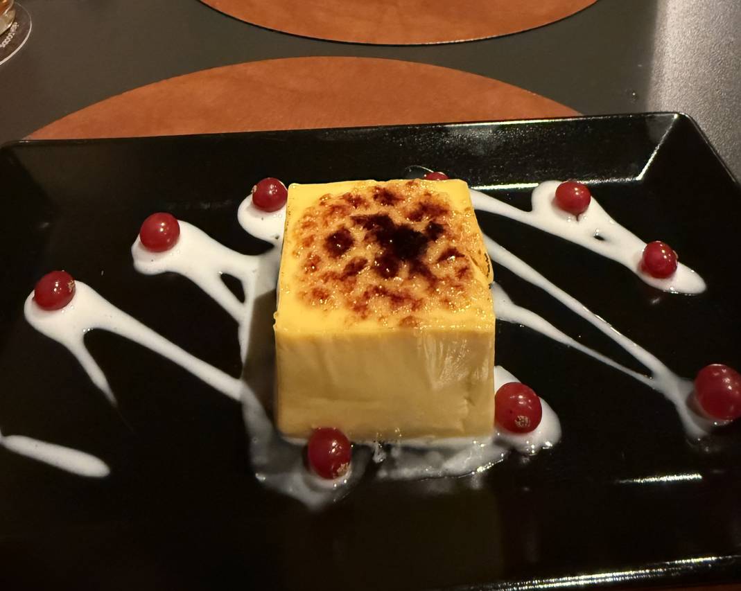 Delicious passionfruit dessert on a table at Turonda Ortisei, Italy.