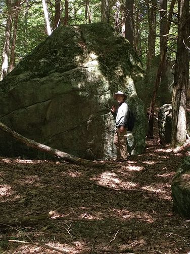 Large erratic can be seen along the trail