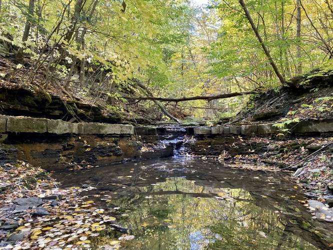 Waterfall, approx. 3-feet tall, 10-feet wide (trickle of water)